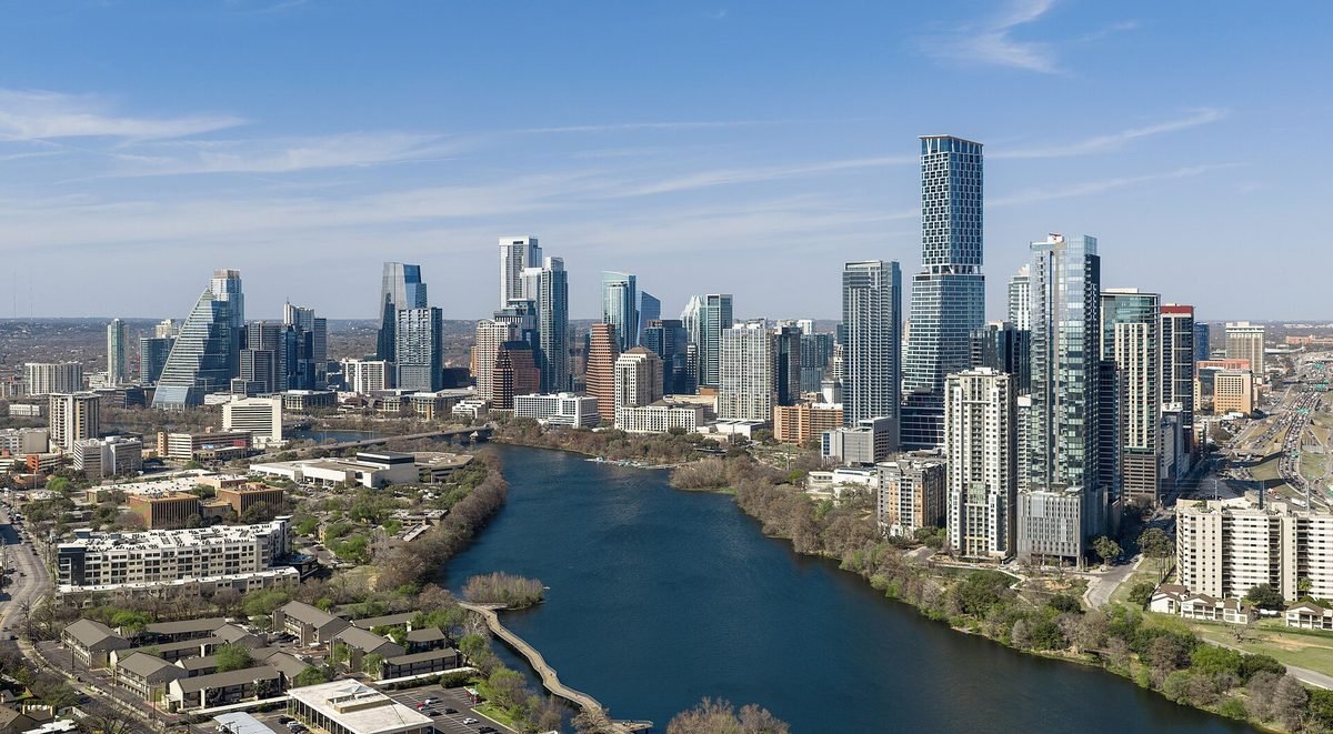 The Austin skyline rising above Lady Bird Lake on a clear day
